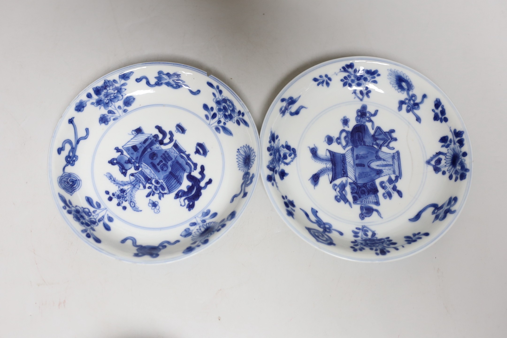 A Chinese blue and white landscape dish, Qianlong period 31cm diameter, together with a similar pair of tea bowls and saucers